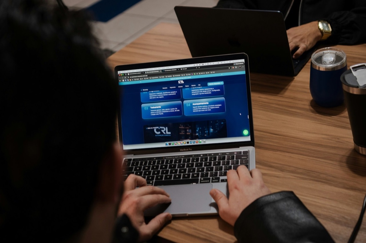 Website displayed on a MacBook during a collaborative work session